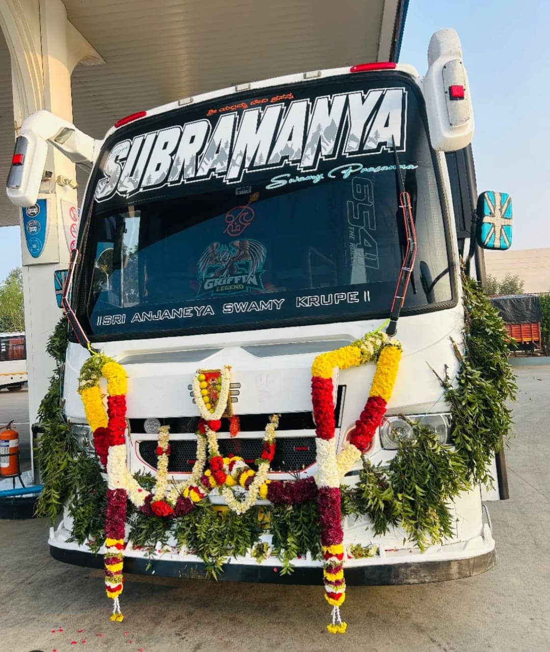 A Sri Subramanyaswamy coach garlanded with flowers before a temple trip