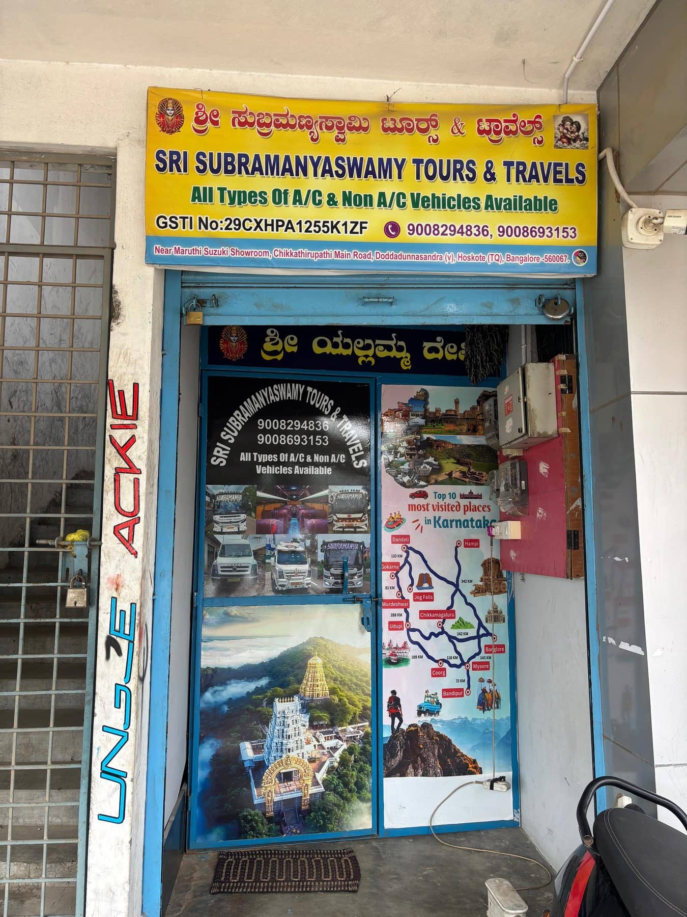 The Sri Subramanyaswamy Tours & Travels branch signboard on Chikkathirupathi Main Road, Hoskote