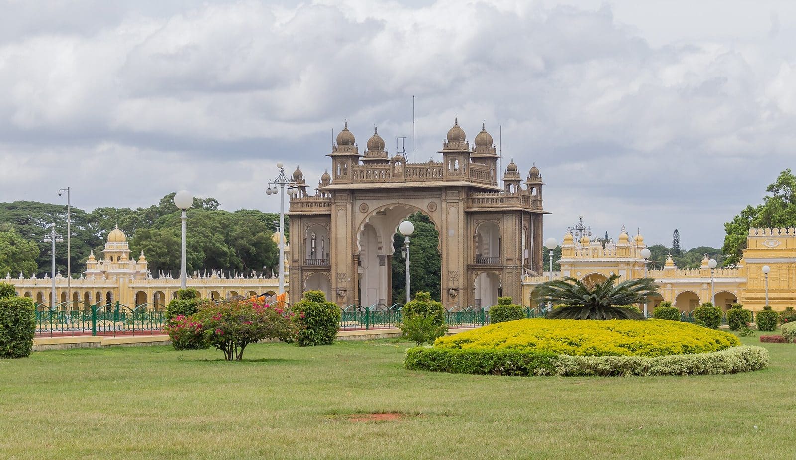 Amba Vilas Palace in Mysore with its ornate entrance gate and gardens